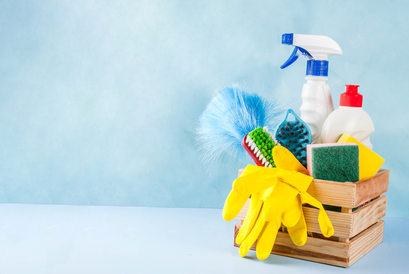 Spring cleaning concept with supplies, house cleaning products p